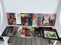 15 jazz LP jackets arranged on tabletop