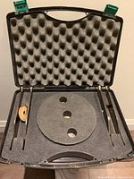 Open view of the DIMAR Dado Set case showing fitted foam insert containing blades and parts for the dado set.