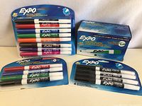 Four different Expo dry erase marker packs showing assorted colors including black, green, red, blue, brown, purple markers in plastic packaging and a box.