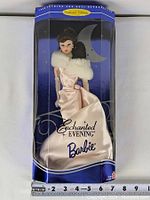Front of Barbie Enchanted Evening doll sealed in original box with blue and purple color scheme and crescent moon and stars design.