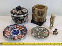 Overview showing all six items in the lot arranged on the floor with measuring tape showing scale.