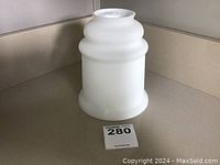 Single matte white frosted glass lamp shade with bell/urn shape and smooth matte finish.