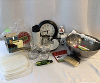 Full lot of assorted kitchen items including cookware, bottles, utensils, and accessories on white backdrop