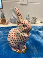 Front-right angle showing full fishnet pattern and posture