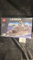 Front of the box showing the assembled Legion Destroyer naval ship model on the sea with the Dragon Blok and Legion branding and the 528 piece count