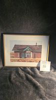 Full view of framed print depicting the Hespeler Railroad Station with visible mat and frame, showing signature at bottom, in good condition with minor dust on frame.
