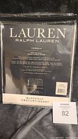Front packaging showing Ralph Lauren Lauren branding, product name Terrain Snowflake, blackout curtains, size 54x84 inches, material details, and blackout indication.