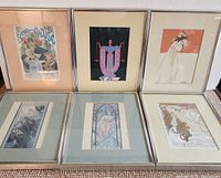 Six framed Art Nouveau poster prints displayed together, showing varied designs and subjects