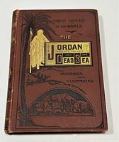 Front cover of the 1880 book 'The Jordan and Its Valley and The Dead Sea' showing embossed brown cloth with gold and black decoration.