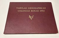 Closed hardcover book with maroon cover and gold embossed title 'TABVLAE GEOGRAPHICAE COLONIAE BONAE SPEI'.
