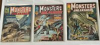 Three Marvel Monsters Unleashed magazines side by side showing covers of issues #4, #9, and #11