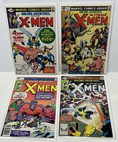 Four Marvel Amazing Adventures X-Men comic books displayed, issues #5 through #8 each bagged and boarded.