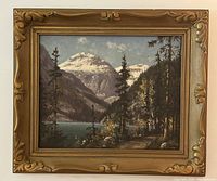 Full view of framed oil painting showing mountain lake landscape