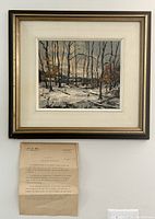 Framed painting on wall with resume document below