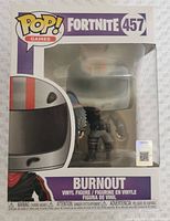 Front view of unopened Funko Pop! Games Fortnite Burnout vinyl figure in original packaging, showing figure and box details