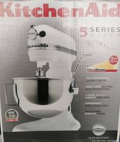 Front of original box showing mixer image, KitchenAid logo, model and features