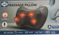 Front view of Sealy Shiatsu massage pillow box showing the product and key features such as infrared heat, multifunction massage therapy, 4 deep kneading massage nodes, one-touch operation, 15-minute auto off, deep muscle relief, and charger and carry bag included.