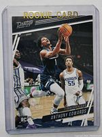 Front of Anthony Edwards rookie card showing player in action and rookie card label.