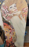 Full view of the painting showing a nude woman with flowers and decorative background inspired by Gustav Klimt style.
