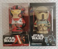 Front view of two Star Wars BeBots figures in original packaging: Poe Dameron and Rogue One Shoretrooper.