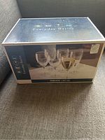 Closed box showing Everyday Basics branding and product image of wine goblets set of 11