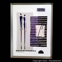 Framed illustration featuring tall abstract human figures and geometric stripe patterns in black and white within a brushed aluminum frame.