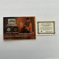 Full view of set mounted on card with Native American image and Certificate of Authenticity.