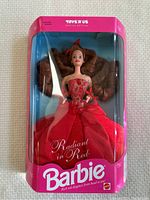 Front view of Barbie doll in original sealed box featuring Radiant in Red gown, labeled Toys R Us Special Edition.