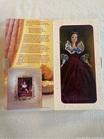 Front of the Hallmark Sentimental Valentine Barbie box showing the doll in a burgundy velvet Elizabethan style gown with lace collar and headpiece.
