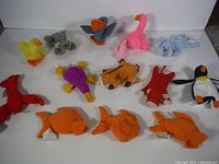 All 12 Beanie Babies toys displayed from the front and top on a white background.