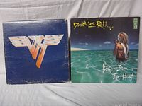 Front covers of Van Halen II and David Lee Roth Crazy from the Heat vinyl records showing cover artwork and condition.
