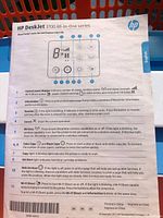 Photo showing instruction sheet of HP DeskJet 3700 All-in-One series explaining control panel and wireless functionality.