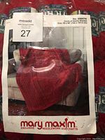 Photo of the Mary Maxim Circle of Hearts Blanket crochet pattern sheet showing finished design and size 48 x 66 inches.