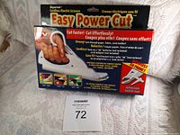 Front view of the Supertek Easy Power Cut cordless electric scissors box showing product name, features, and images of materials it can cut.