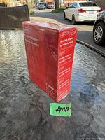 Photo of 5-pack box of standard staples in sealed red packaging, labeled 25,000 staples.