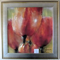 Front full view of the framed giclee print depicting tulips in warm orange-red tones against a soft green background. The artwork appears textured, mimicking an oil painting.