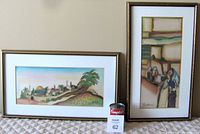 Both framed watercolour paintings side by side showing their relative dimensions and framing style.