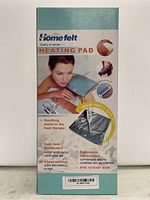 Packaging box with product branding showing features and size of the heating pad