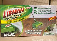 Box of the Libman Spiral Sweep Broom showing product features like no batteries or cords, no bags or dust pans, and easy empty large waste bin.