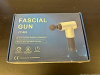 Box of CY-801 Fascial Gun Muscle Massager showing branding, model, features and specifications.