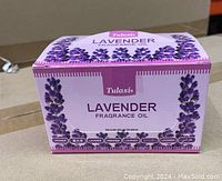 Closed box of Tulasi Lavender Fragrance Oil showing product name and lavender flower graphics