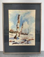 Framed watercolor painting of birch trees in a winter landscape, showing entire artwork with frame and matte.