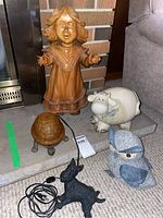 Photo showing the lot with the 18 inch resin girl figurine, ceramic cow, plush owl and Scottie dog near turtle lamp as reference