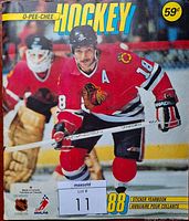 Front cover of the 1988 O-Pee-Chee Hockey Sticker Album with a player from the Chicago Blackhawks on the cover, album price 59 cents.