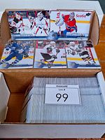 Box of trading cards displayed with 6 cards visible showing various NHL players including goalies and skaters from the 2016-17 Upper Deck Series Two set.