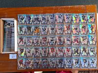 Complete set of 2007-08 McDonald's hockey cards displayed in card protectors and box with spare cards.