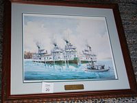 Full view of the framed limited edition print depicting four mail boats on Lake Rousseau, showing wood frame and triple matte border.