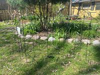 Overall view of multiple garden dividers arranged around a bed