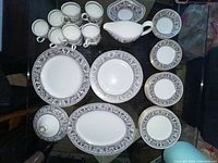 All pieces arranged top-down on black surface