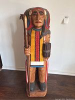 Front elevation of full statue showing overall form, scale and paint finish